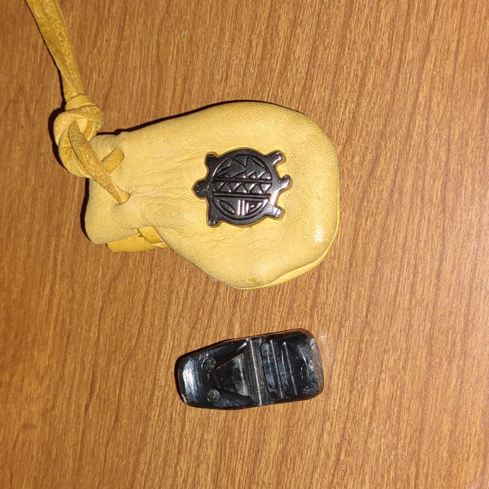 Silver tone turtle amulet with black Hawaiian face carved  soapstone cry…